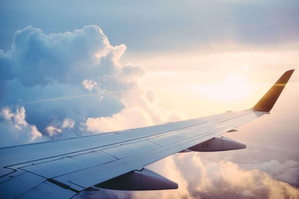 wing flying through clouds